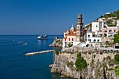 The picturesque fishing village of Atrani and a cruise ship on the Amalfi Coast, Campania, Italy