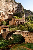 Medieval bridge and gothic chapel of the Santo Crsito and Santa Maria de la Hoz in Tobera Burgos Castilla Leon Spain