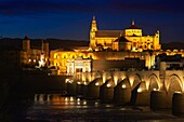 Guadalquivir river, Roman bridge and mosque-cathedral at Dusk  Córdoba  Andalusia  Spain