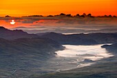 Sunrise over Llynnau Mymbyr and Capel Curig village from Gallt y Wenallt, Snowdonia National Park, Wales