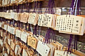 Prayer tablets written by visitors to the Meiji Jingu Shrine, Tokyo, Japan