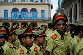 Young Cuban boys, students of the Camilo Cienfuegos Military School, waiting in a line in Havana, Cuba, 4 February 2009  About 50 years after the national rebellion, led by Fidel Castro, and adopting the communist ideology shortly after the victory, the C