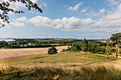 View over countryside at the Baltic Sea, Goehren, Island of Ruegen, Mecklenburg West-Pomerania, Germany