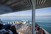 View across Lake Constance, Ferry with cars and bikes, Lake Constance, Baden-Wuerttemberg, Germany