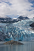 Scenic view of Shoup Glacier with a camp tent set on a island in the distance, Shoup Bay State Marine Park, Prince William Sound, Southcentral Alaska