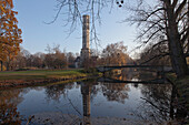 Pond in Brunswick park with decorated chimney, city park, Brunswick, Lower Saxony, Germany