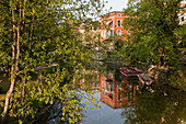 Residential building along the river Oker which encircles the medieval town and formed part of the defences, Brunswick, Lower Saxony, Germany