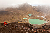 blocked for illustrated books in Germany, Austria, Switzerland: Hike through lava fields and gravel, past turquoise Emerald Lakes, Tongariro Alpine Crossing, Tongariro National Park, North Island, New Zealand