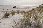 4WD camper parked on a remote beach, Northland, North Island, New Zealand