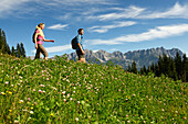Hikers on Hausberg mountain, Hartkaiser, View towards Wilder Kaiser, Tyrol, Austria