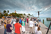 Tightrope walker at the Daily Sunset Celebrations, Mallory Square, Key West, Florida Keys, Florida, USA