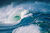 Turbulent shorebreak waves with whitewash.