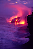 Hawaii, Big Island, Volcano lava meets the sea, steam rising, twilight A28E
