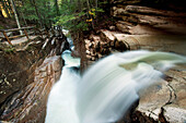 New England, New Hampshire, White Mountains, Sabbaday Falls, A forest waterfall.