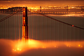 Golden Gate bridge on San Francisco bay at night surrounded by fog. , Golden Gate Bridge, California, USA