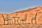 Chairs and table in the Merzouga sand dune in Morocco