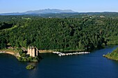 France, Cantal (15), Lanobre, Castle Val (XVth century), Historical monument, it is situéen edge of the artificial lake of Bort-les-Organs (aerial photo)