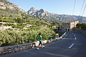 Road MA-2121 near Fornalutx with terraced fields in the direction of Soller valley, Tramuntana mountains, Mallorca, Balearic Islands, Spain