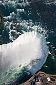 AERIAL OF HORSESHOE FALLS NIAGARA WATERFALLS ON BORDER OF ONTARIO CANADA NEW YORK STATE USA