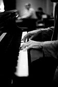 Pianist in the bar of the Grand Hotel  Black and White