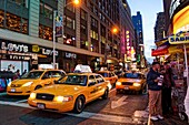 Taxis, Night view of Times Square, Manhattan, New York, USA