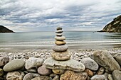 Stone cairn in La Concha de Artedo beach, Cudillero, Asturias, Spain