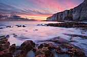 Spectacular sunrise above the chalk cliffs of the Alabaster Coast in northern France near Etretat, Normandy, France