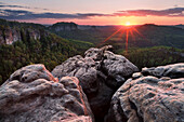 Sunset above the Saxony Switzerland national park with a wide view over the Rocks of Kleiner Dom in Spring, Saxony, Germany