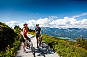 Mountain bikers on a gravel raod, Duisitzkar, Planai, Styria, Austria