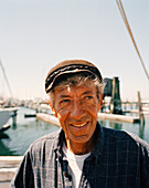 USA, Rhode island, Newport, close-up of a happy senior man looking away.
