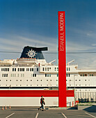 TURKEY, Istanbul, people walking beside Istanbul Modern Museum and a cruise ship