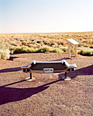 USA, Arizona, historic car bumper, Petrified Forest National Park, Painted Desert