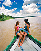 BRAZIL, Belem, South America, teenage girls sitting on the deck of boat, Furo de Benedito
