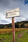 USA, California, a sign directing hikers to one of the many trails at Bartholomew Park winery and vineyard