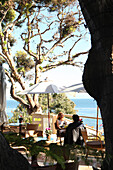 USA, California, Malibu, outdoor seating at the infamous designer restaurant, Geoffrey's