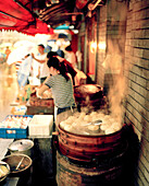 CHINA, Hangzhou, steam buns in container at the market