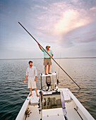 USA, Florida, fishing for Redfish on boat, New Smyrna Beach