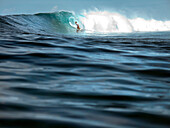 INDONESIA, Mentawai Islands, Kandui Resort, surfing a wave at Bankvaults