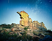 MADAGASCAR, rock formation against blue night sky, stars, Isalo National Park