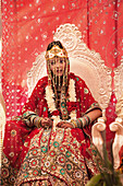 MAURITIUS, portrait of Bride Anishtah Hurloll during the ceremony at her Hindu wedding in the town of Surina