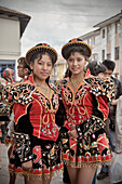 Voung peruvian girls with tradtional dresses during a procession in Cusco, Cuzco, Peru, Andes, South America