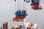Tandem container crane for loading and unloading a ship, Burchardkai, Hamburg, Germany