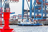 Harbour tug boat in the Container Terminal Altenwerder, Hamburg, Germany