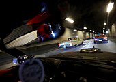 Modern classic cars passing Elbe Tunnel, Motoraver group, Hamburg, Germany