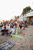 Guests on the beach of cafe AHOI, Hamburg-Oevelgoenne, banks of the Elbe, Hamburg, Germany