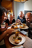 Chefs of mobile kitchen unit 'Kitchen Guerilla' in restaurant Klippkroog, Grosse Bergstrasse, Altona, Hamburg, Germany