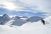 Group of backcountry skier ascending to Sagtaler Spitzen, Kitzbuehel Alps, Tyrol, Austria