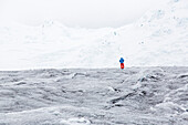 Man walking over a glacier, Artesonraju, Paron Valley, Caraz, Huaraz, Ancash, Cordillera Blanca, Peru