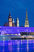 River Danube, Lentos art museum for modern and contemporary art and the steeples of the churches from the old town (from left: parish church, Old Cathedral and New Cathedral, also called Mary-Immaculate Conception, Linz, Upper Austria, Austria