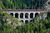 Passenger train on the Krausel-Klause Viaduct, UNESCO World Heritage Site, built 1848-1854